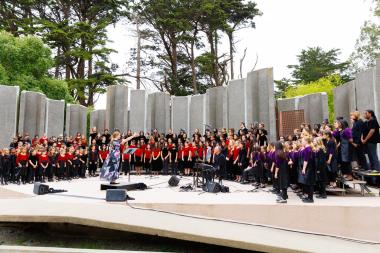 San Francisco Girls Chorus performs in amphitheater.