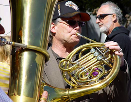 Even in the midst of conflict, Bruce Roberts' gleaming French horn looks good Photos by Michael Strickland