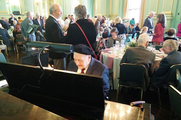How typical: the crowd in the Green Room on Sunday was getting ready to celebrate Donald Pippin, while he busied himself with a quick piano warmup (Photo by Janos Gereben)