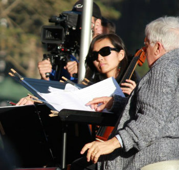 Kronos Quartet cellist Sunny Yang, with Van Dyke Parks, at the Hardly Strictly Bluegrass Festival (Photo by Jeff Kaliss)