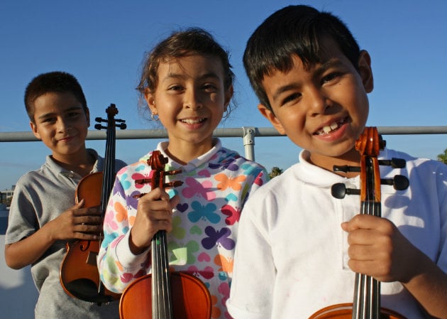 Students from the Music Mission San Francisco program started in 2015 with 20 new instruments provided by the Open String (Photo by Adrian Arias/MMCLA)