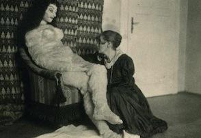 Herman Moos posing with the Alma doll, 1918