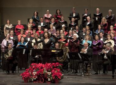 . Maestra Elena Sharkova, directs the Symphony Silicon Valley Chorale for Carols In The California