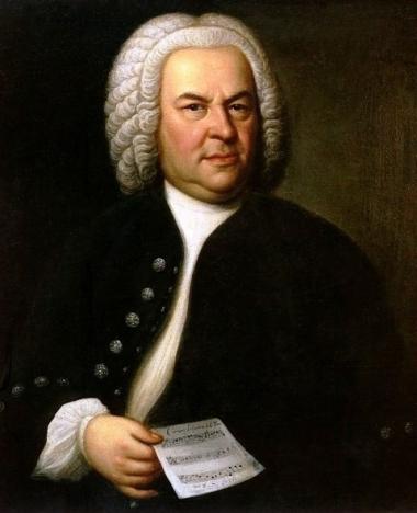 A portrait of Johann Sebastian Bach in a white shirt, black jacket, and white-haired wig holding sheet music.