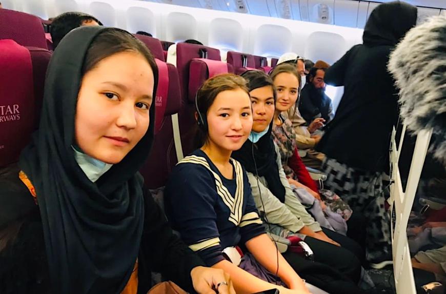Afghan music refugees on plane