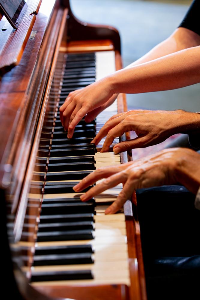 Hands at a piano
