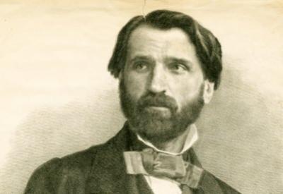 A sepia portrait of Giuseppe Verdi as a young man.
