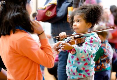Community Music Day includes a String Instrument Petting Zoo, where little kids can touch and play violins and other string instruments. 