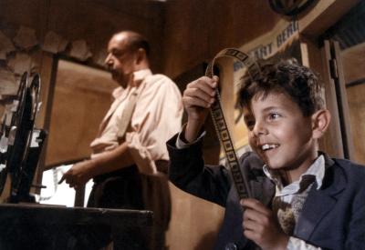 Young Salvatore discovers a love of film at the Cinema Paradiso movie house. 