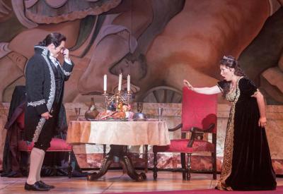 Opera San José concludes its 2022-23 season with a vivid production of Puccini’s "Tosca," presented April 15–30, 2023 at the California Theatre in San Jose.  Seen here: Matthew Hanscom as Scarpia and Olga Chernisheva as Tosca in OSJ's 2015 production.