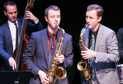 Twin brothers Peter and Will Anderson play the saxophone.