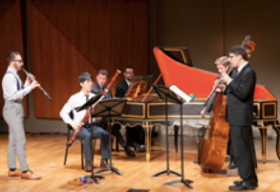 The Colburn School Baroque Ensemble members perform on stage.