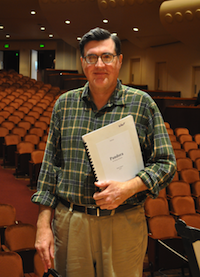 Mark Volkert, with the score of <em>Pandora</em> Photo by Annie Phillips