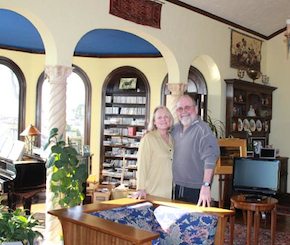Nancy Quinn and Tom Driscoll in their Monterey Heights home, one of the most active local locations for house concerts and other arts events. Photo by Jeff Kaliss 
