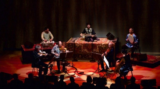 The Kronos Quartet performing with Homayun Sakhi Trio (Photo by Evan Neff)