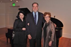 Co-chair Suzie Woodward Morris and Mary Falvey with Garrick Ohlsson in front of the Steinway