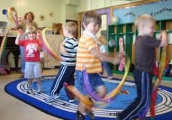 Students perform a Dalcroze exercise