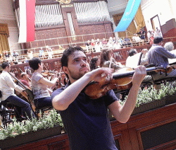 Violinist Leor Maltinski at a rehearsal in Prague
