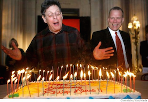 David Gockley presented Philip Glass with a birthday cake for his 70th birthday in 2007, when SFO premiered Glass' <em>Appomattox</em>